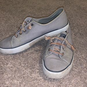 Gray Sperry shoes, worn